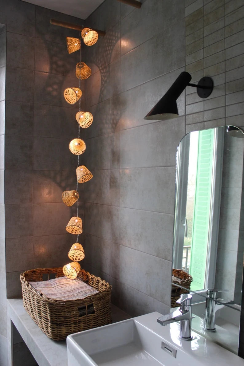 Outdoor LED string lights with 16 bamboo shades, 4.5m long. Plug and transformer are included.